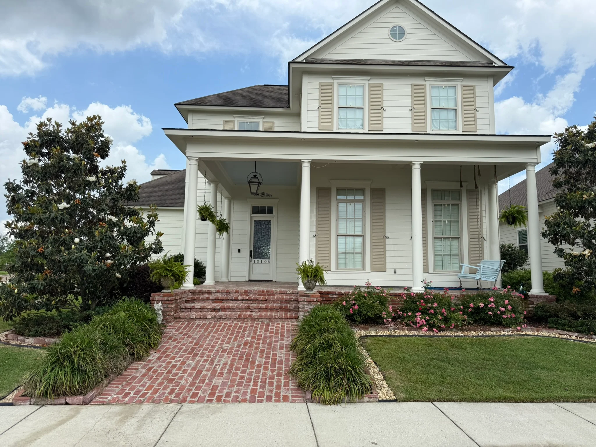 A Satsuma Alabama ranch-style home with clean, freshly washed siding showing no visible mold or mildew streaks after soft wash house washing service. The exterior trim and soffits appear free of biological buildup against a clear Alabama sky.